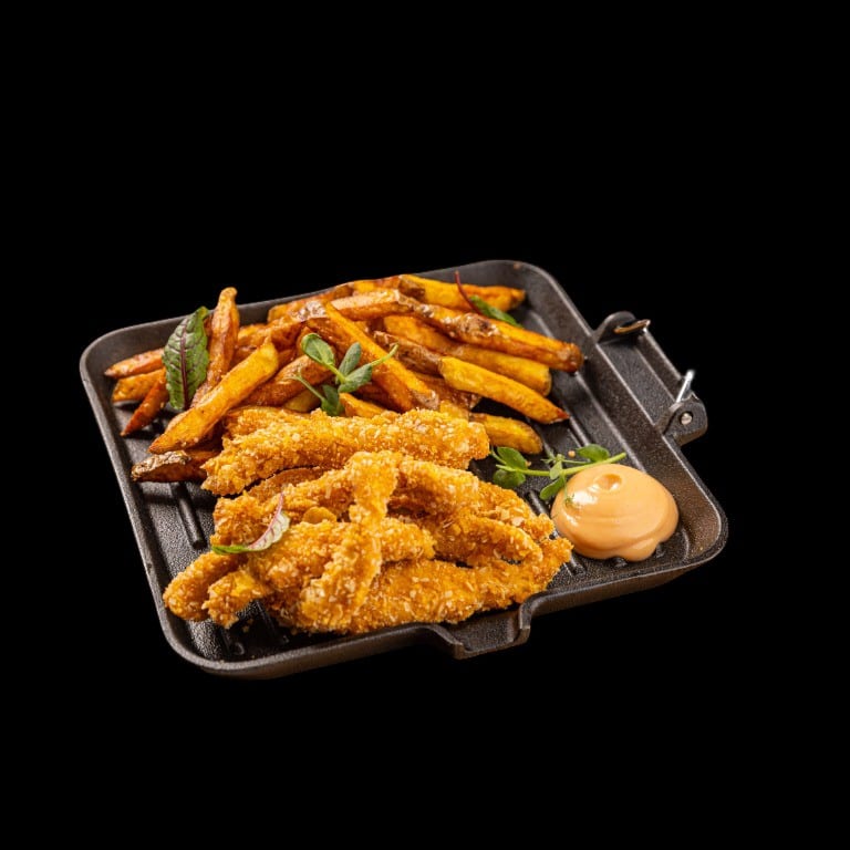 Chicken fingers with fries.