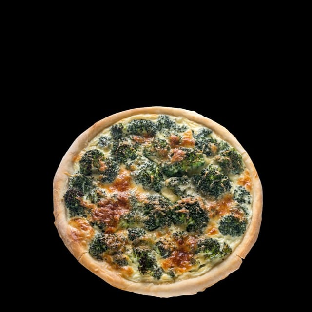 Chicken & broccoli pizza.