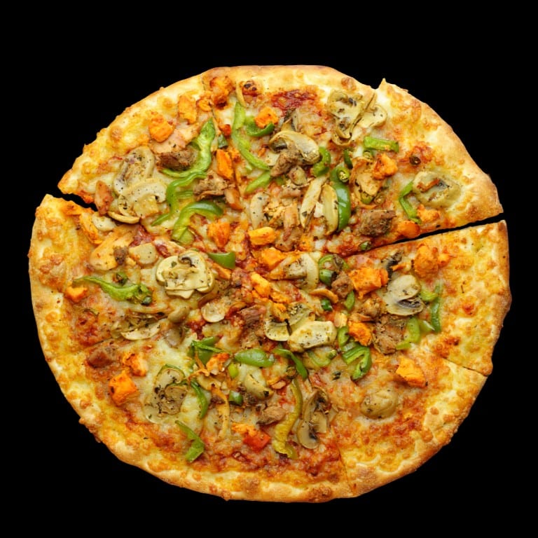 Grilled chicken Caesar pizza slice.